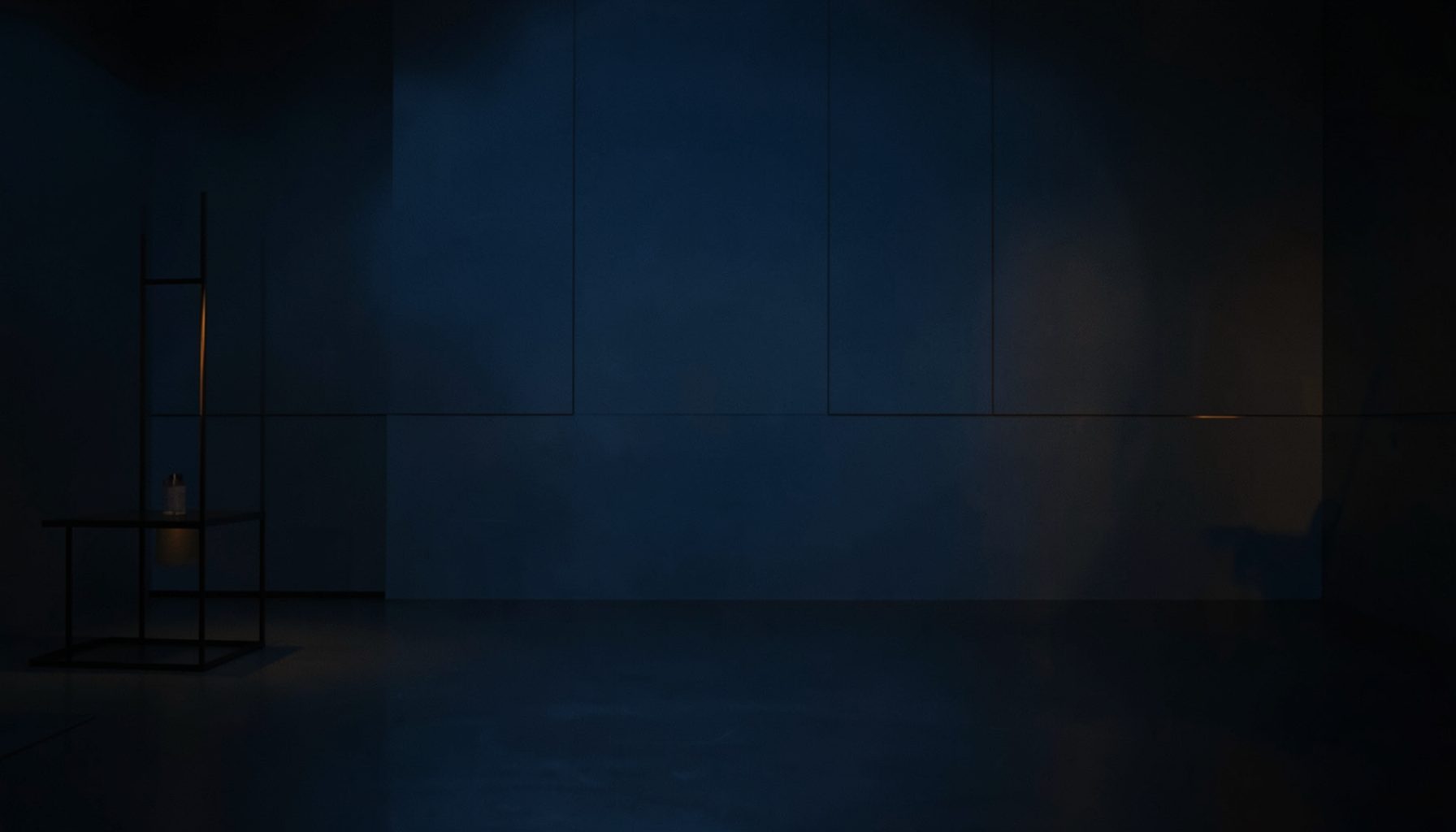 Dark atmospheric backdrop with deep blue and charcoal tones, subtle warm amber highlights, and a clean modern retail feel